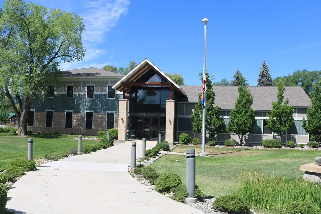 Bayfield town hall, a two-story building with a gabled entry and landscaped walkway